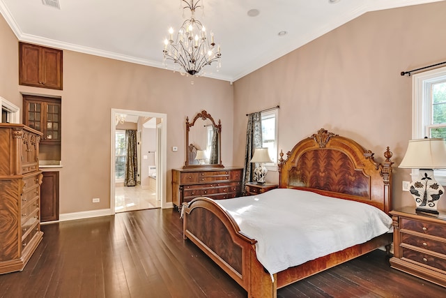 bedroom with ensuite bathroom, ornamental molding, dark wood-type flooring, and an inviting chandelier