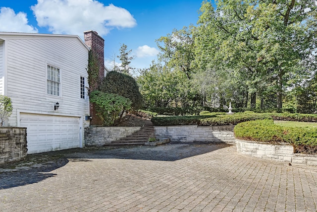 view of patio with a garage