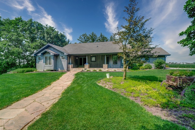 ranch-style house with a front lawn