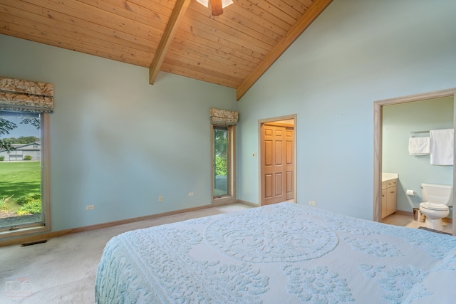 bedroom with ensuite bath, high vaulted ceiling, wooden ceiling, ceiling fan, and light carpet