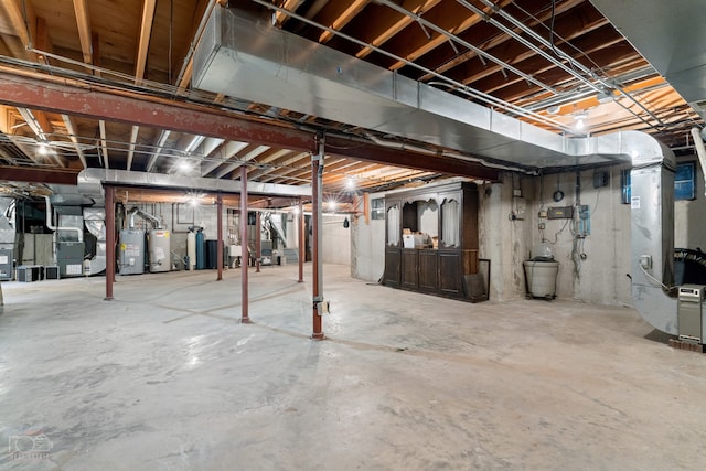 basement featuring gas water heater