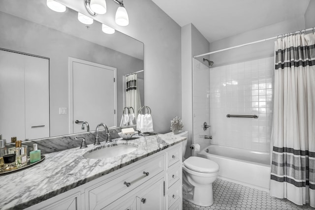 full bathroom with shower / tub combo, toilet, tile floors, and vanity