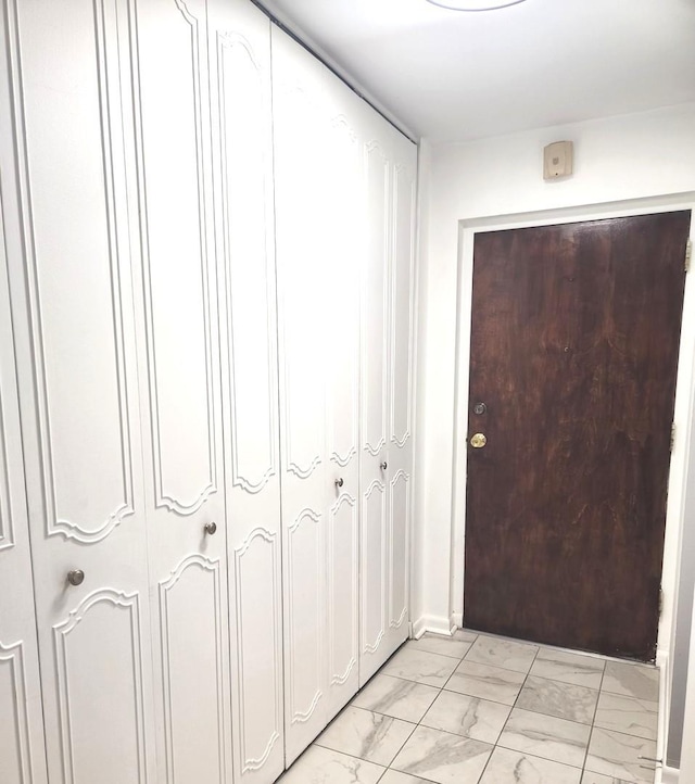 interior space with marble finish floor
