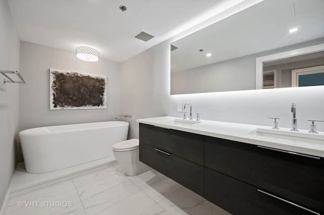 bathroom featuring dual vanity, tile flooring, and toilet