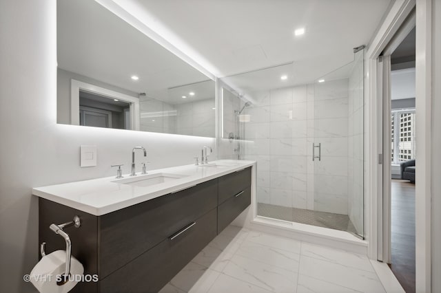 bathroom with walk in shower, dual bowl vanity, and tile flooring