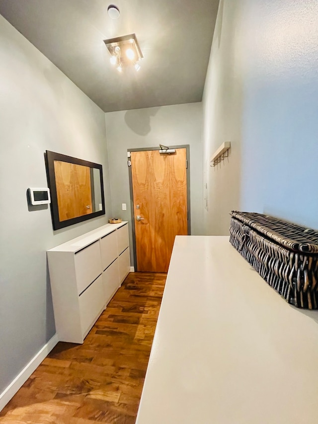 interior space with dark hardwood / wood-style floors