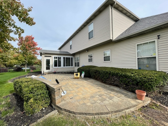 back of property with a patio area