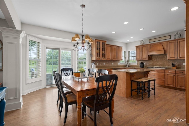 5085 Half Round Rd, Oswego, IL 60543 - dining room with light wood-type flooring, recessed lighting, and a chandelier