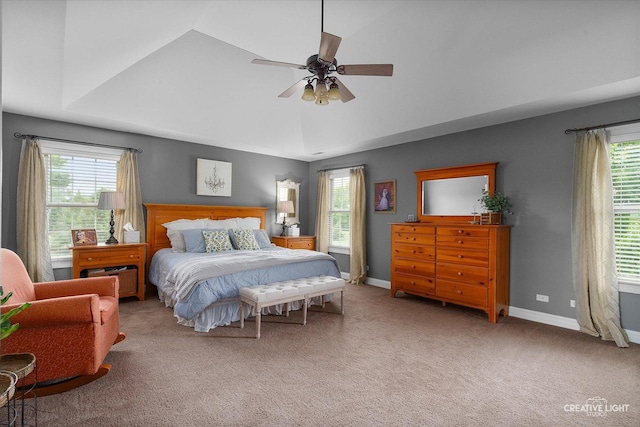 5085 Half Round Rd, Oswego, IL 60543 - carpeted bedroom with multiple windows, baseboards, and a ceiling fan
