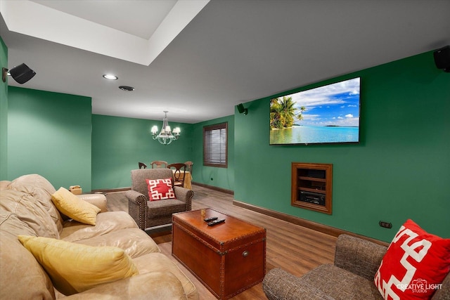 5085 Half Round Rd, Oswego, IL 60543 - cinema with wood finished floors, a chandelier, recessed lighting, and baseboards