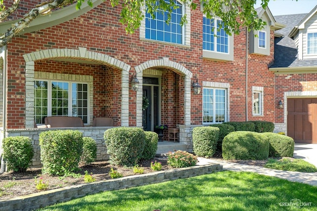 5085 Half Round Rd, Oswego, IL 60543 - view of front of home with brick siding and a garage