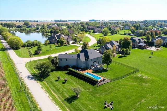 5085 Half Round Rd, Oswego, IL 60543 - aerial perspective of suburban area featuring a pool and a nearby body of water