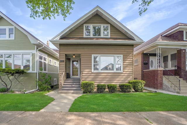 view of front of home featuring a front lawn and a porch