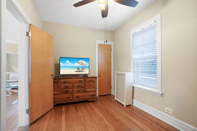 interior space featuring light hardwood / wood-style flooring and ceiling fan