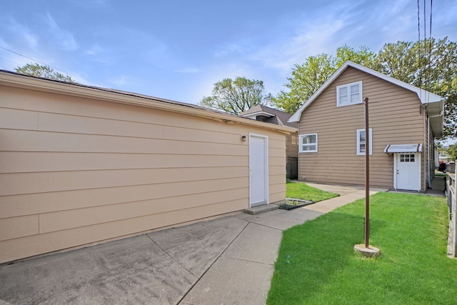 view of property exterior featuring a yard