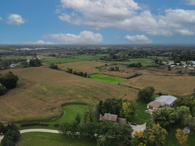 birds eye view of property featuring a rural view