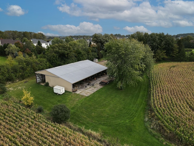 birds eye view of property with a rural view