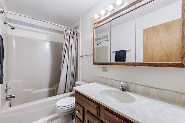 full bathroom featuring toilet, shower / tub combo with curtain, and vanity