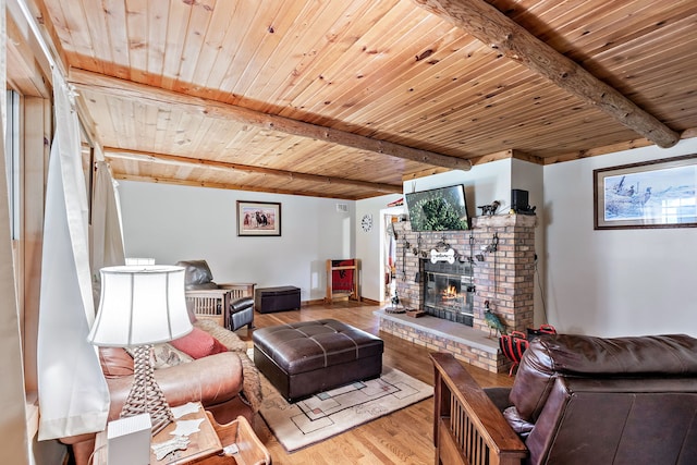 living room with hardwood / wood-style floors, wooden ceiling, and beamed ceiling