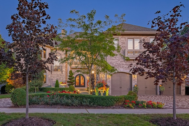 view of front of property featuring a garage