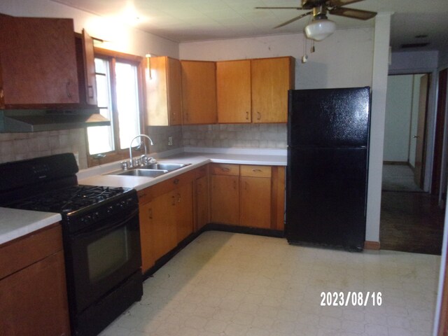 650 W Blue St, Sheldon, IL 60966 - kitchen with backsplash, ceiling fan, black appliances, light tile flooring, and sink