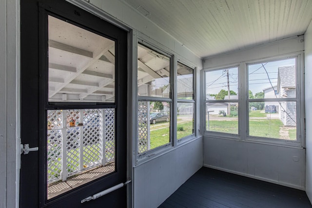 616 N Pleasant St, Princeton, IL 61356 - unfurnished sunroom featuring beamed ceiling