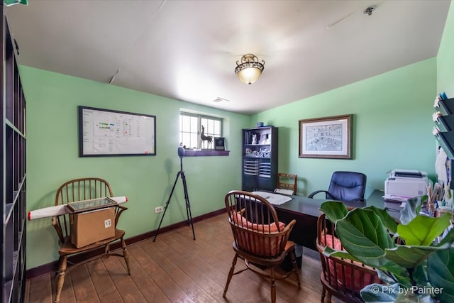 office with dark hardwood / wood-style flooring