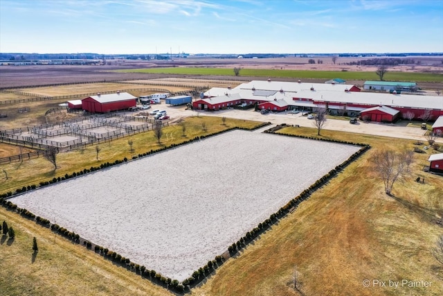 birds eye view of property featuring a rural view