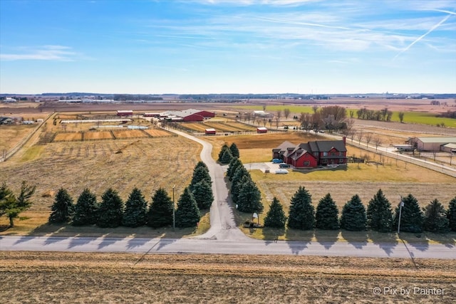 birds eye view of property featuring a rural view