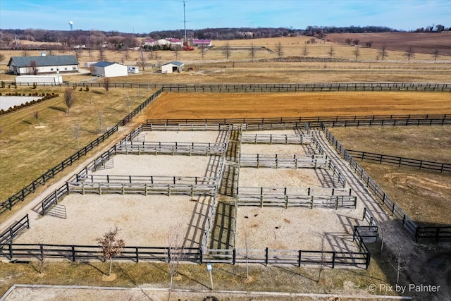 birds eye view of property featuring a rural view