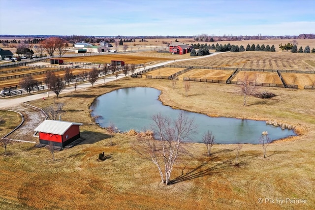 exterior space featuring a water view and a rural view