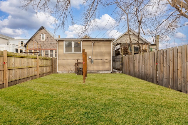 view of yard with a fenced backyard