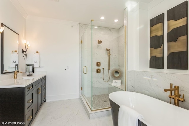 bathroom featuring a marble finish shower, marble finish floor, a freestanding bath, vanity, and recessed lighting