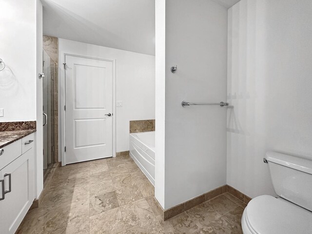 full bathroom with tile patterned flooring, toilet, independent shower and bath, and vanity