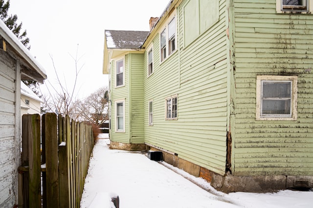 view of snow covered property