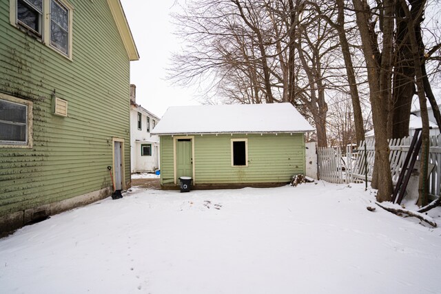 view of snow covered house