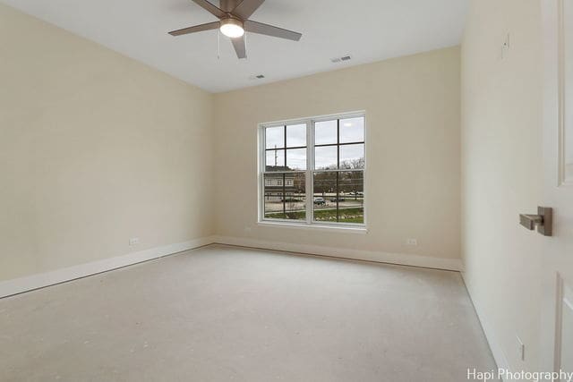 unfurnished room featuring ceiling fan