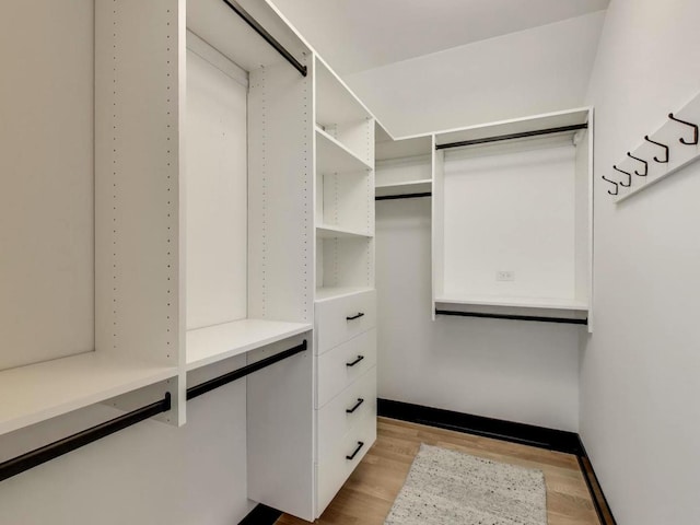 2457 N Talman Ave, Chicago, IL 60647 - walk in closet with light wood finished floors