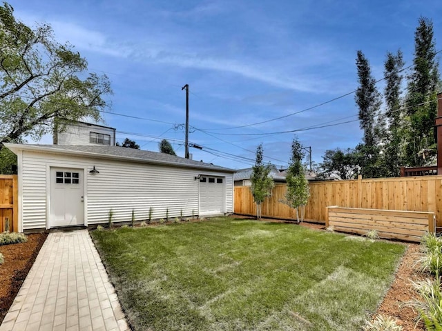 2457 N Talman Ave, Chicago, IL 60647 - view of yard featuring an outbuilding and a detached garage