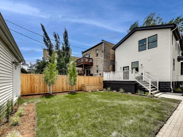 2457 N Talman Ave, Chicago, IL 60647 - view of yard featuring a wooden deck