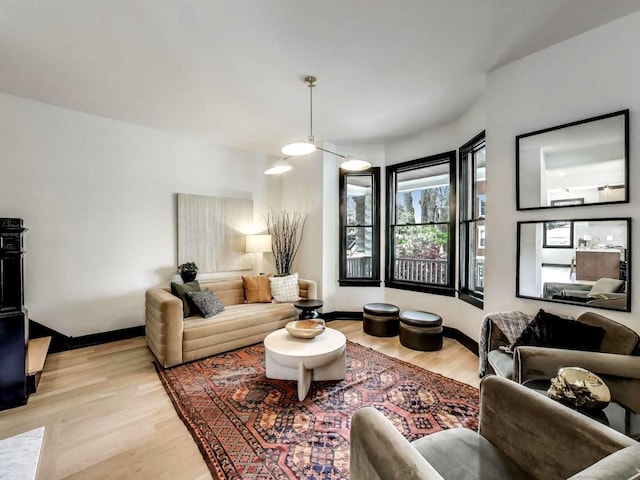 2457 N Talman Ave, Chicago, IL 60647 - living area with light wood-style flooring and baseboards