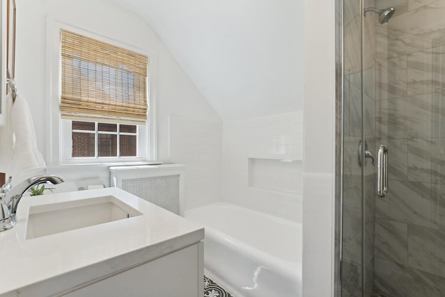 298 Dickens St, Northfield, IL 60093 - bathroom with lofted ceiling, a stall shower, vanity, a bathtub, and radiator