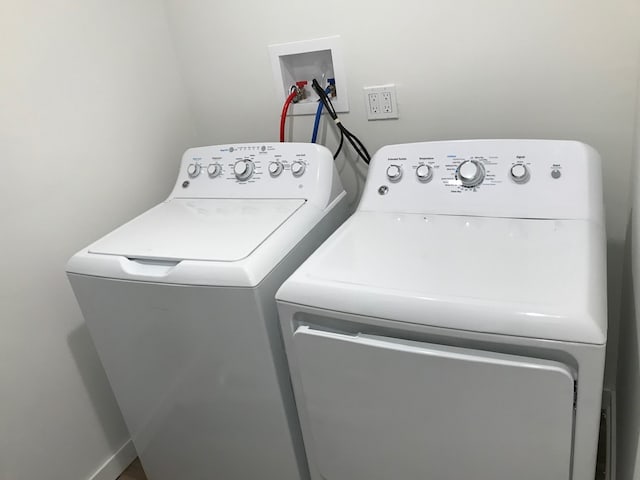 laundry room with washer hookup and independent washer and dryer