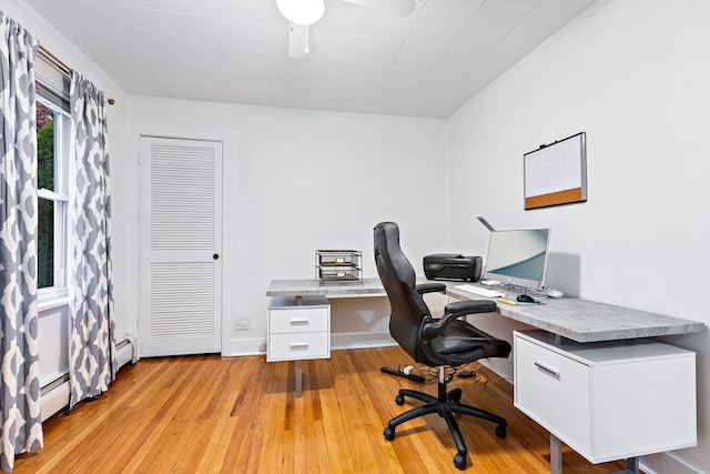 office space with ceiling fan, light hardwood / wood-style flooring, and ornamental molding