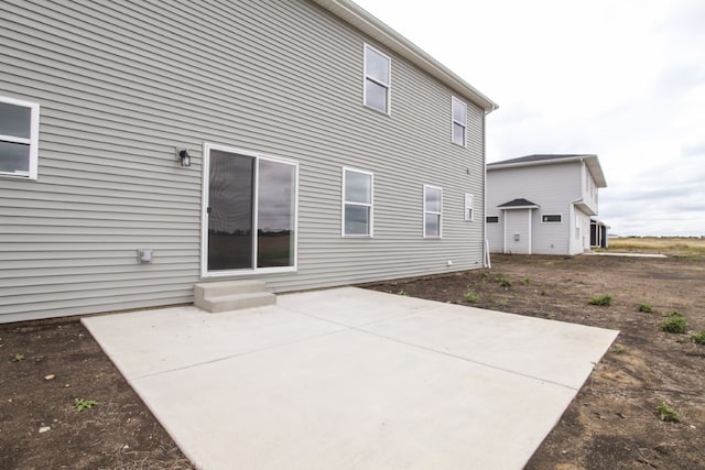 back of house featuring a patio area