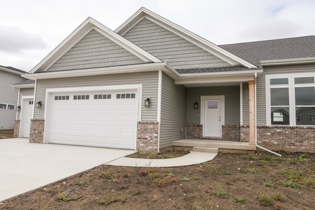 craftsman inspired home with a garage