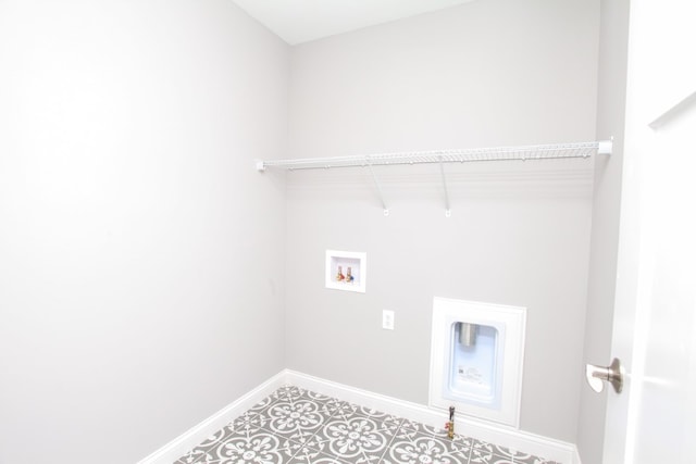 laundry area featuring hookup for a washing machine and tile patterned floors