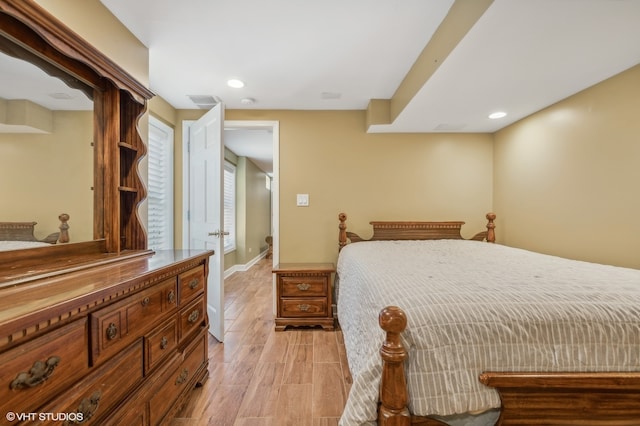 bedroom with light wood-type flooring