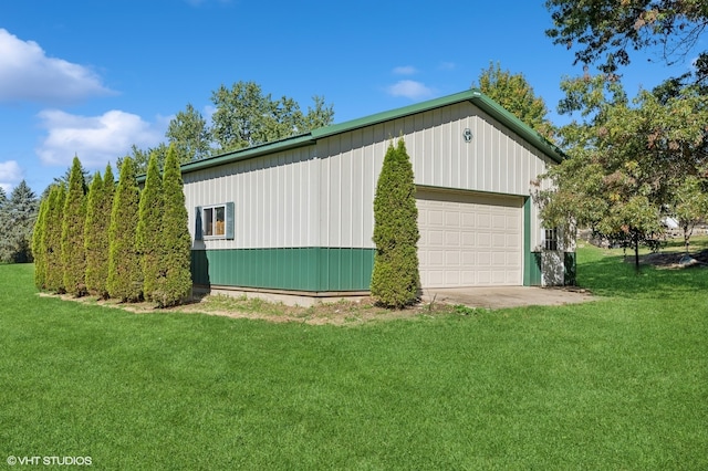 garage with a lawn