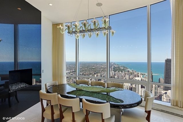 dining area featuring a water view